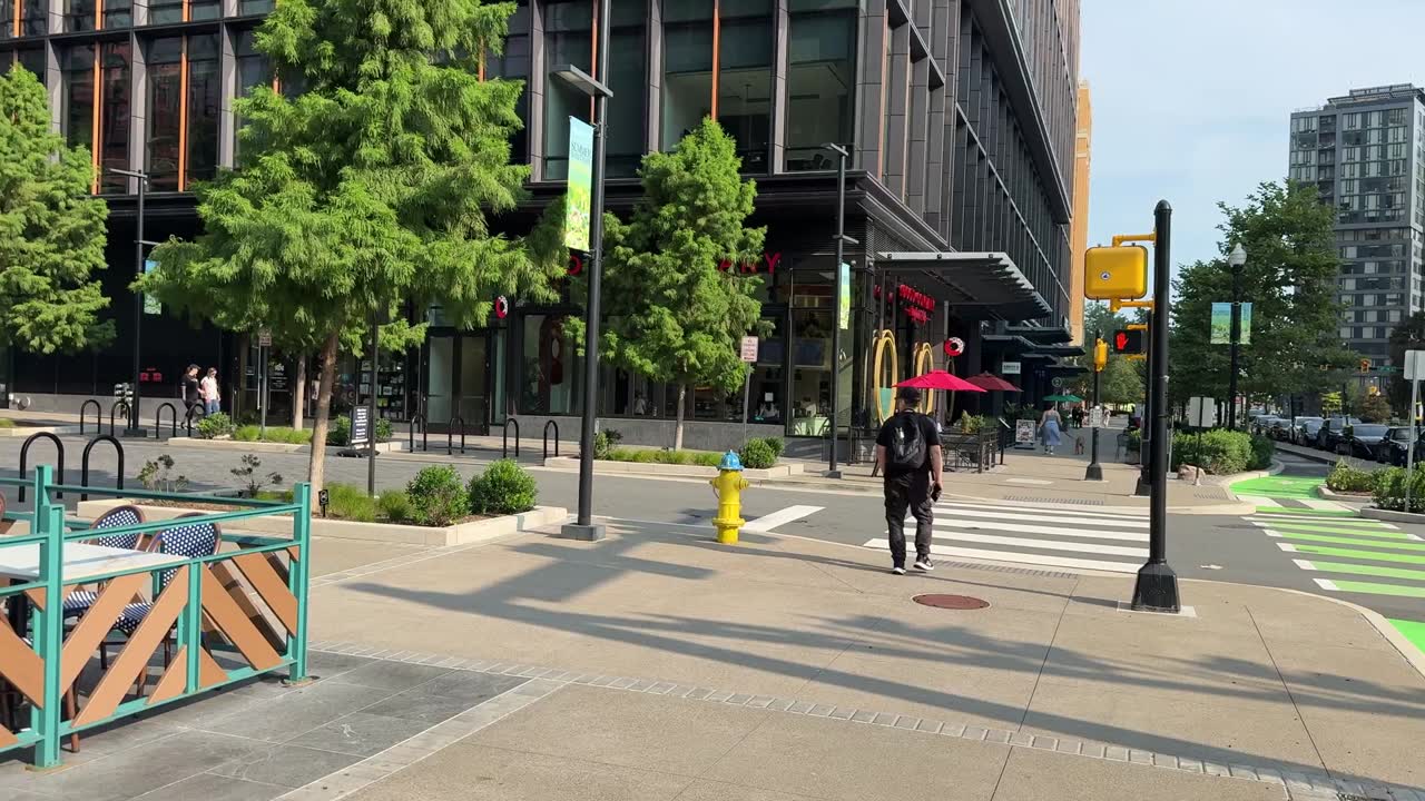 Crosswalk, protected bike lane and streetscape at Metropolitan Park